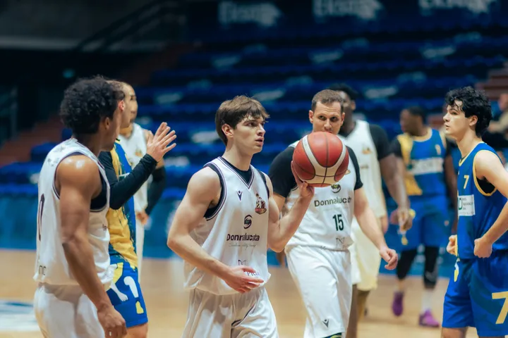Team athletes wearing bright sportswear on a court
